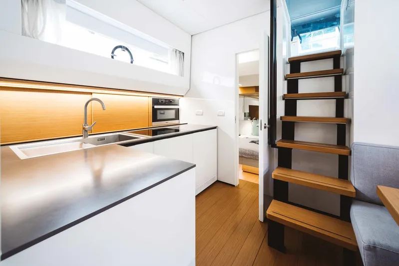 Bluegame 62 Yacht Photos Pics Modern kitchen and staircase in 2019 Bluegame BG62 yacht.