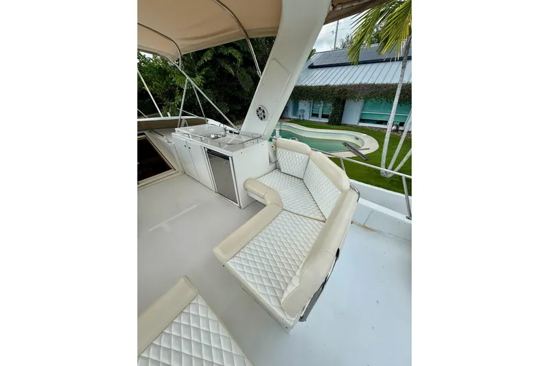Sea B's Yacht Photos Pics Flybridge deck with cushioned seating, starboard