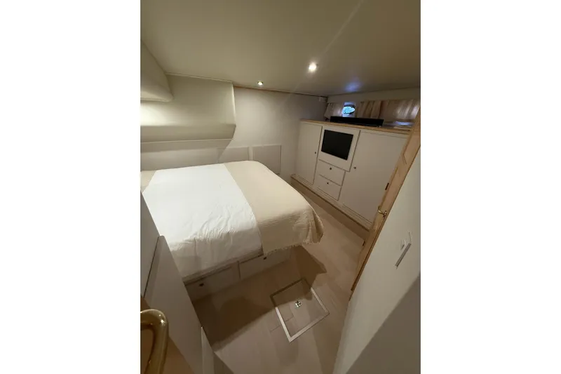Sea B's Yacht Photos Pics Master Stateroom with hanging locker, TV, and storage