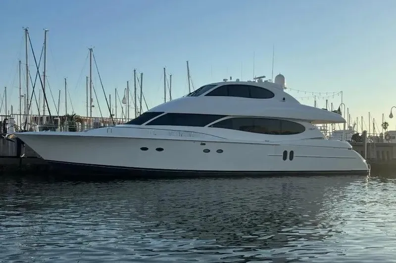  Yacht Photos Pics 2004 Lazzara SC Motor Yacht docked at marina, sleek design, calm water reflection.