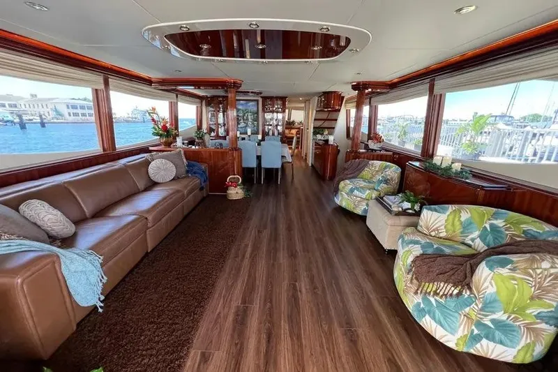  Yacht Photos Pics Luxurious 2004 Lazzara SC Motor Yacht interior with elegant seating and panoramic windows.