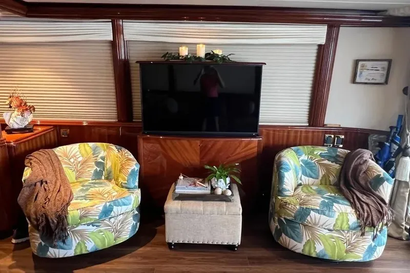  Yacht Photos Pics Luxurious 2004 Lazzara SC Motor Yacht interior with tropical chairs and modern decor.