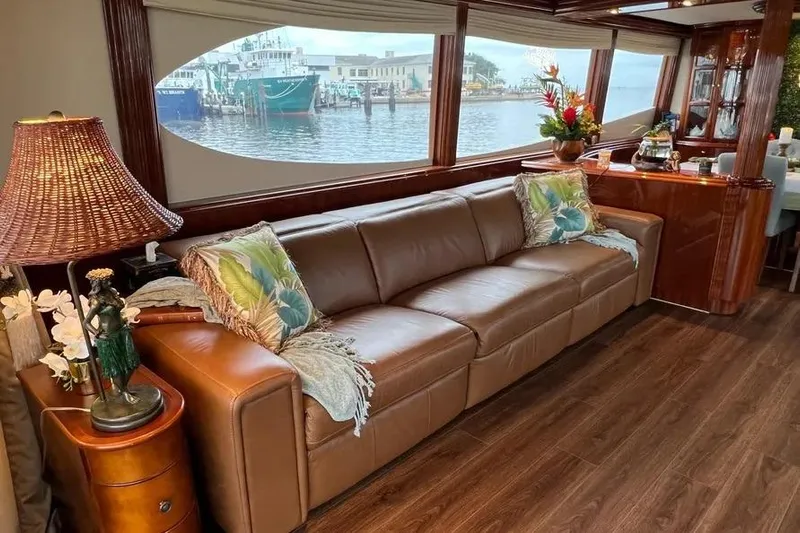  Yacht Photos Pics Luxurious interior of 2004 Lazzara SC Motor Yacht with leather sofa and waterfront view.