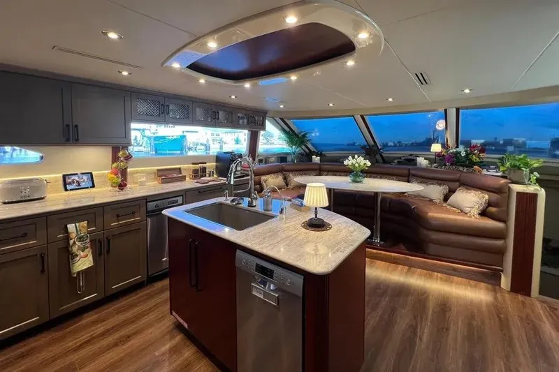  Yacht Photos Pics Luxurious 2004 Lazzara SC Motor Yacht interior with modern kitchen and elegant seating area.