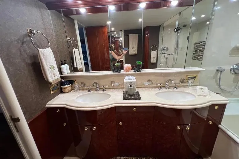  Yacht Photos Pics Luxurious bathroom in 2004 Lazzara SC Motor Yacht with dual sinks and elegant decor.