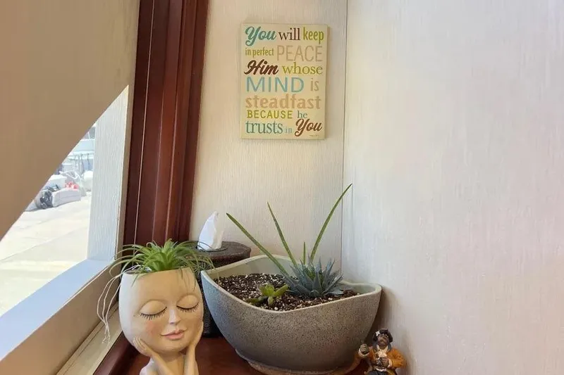  Yacht Photos Pics Decorative plants and inspirational sign on 2004 Lazzara SC Motor Yacht interior.