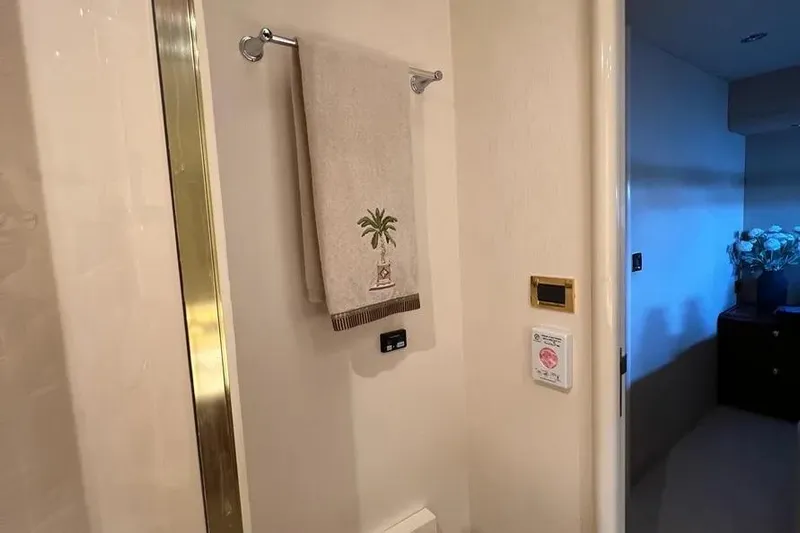  Yacht Photos Pics Luxury bathroom interior of 2004 Lazzara SC Motor Yacht with decorative towel.