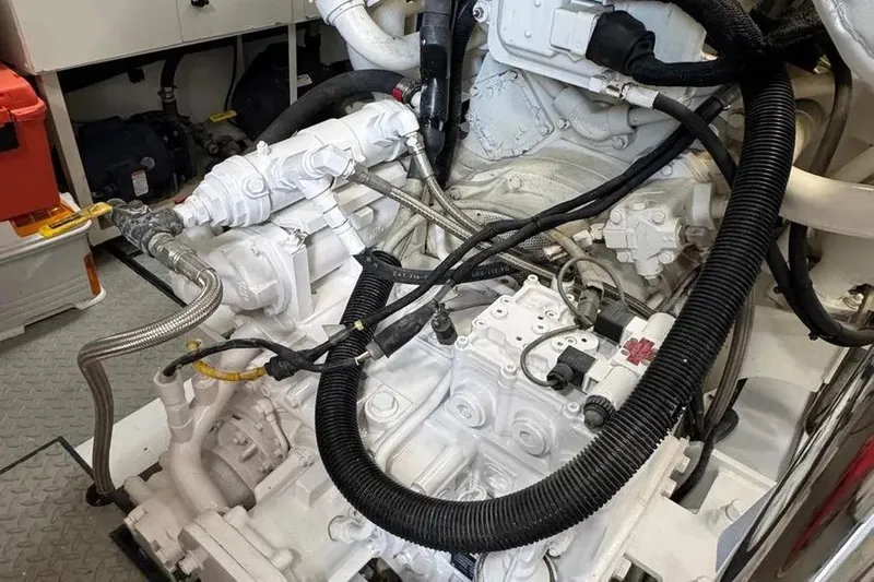  Yacht Photos Pics Engine room of 2004 Lazzara SC Motor Yacht with visible machinery and cables.