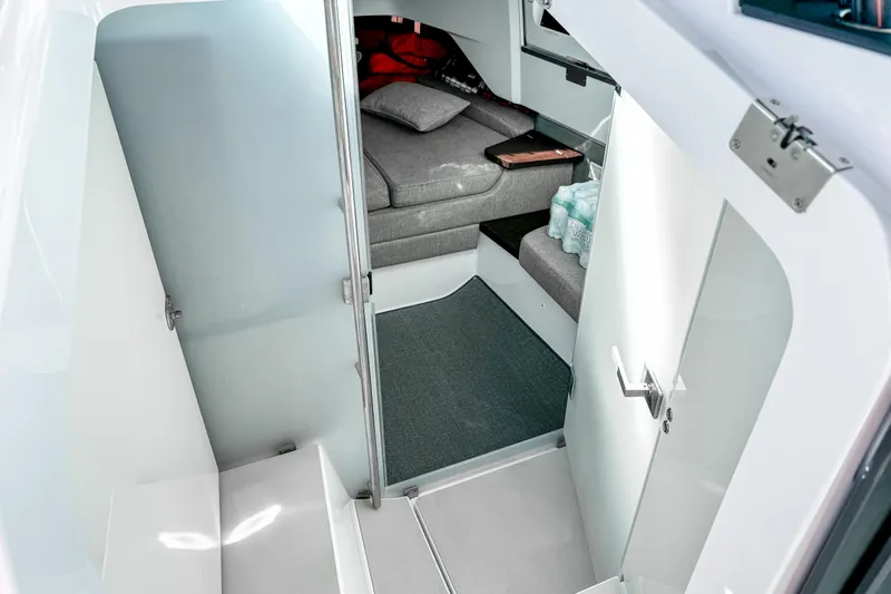  Yacht Photos Pics 2024 Axopar 37XC CROSS CABIN interior with modern seating and sleek design.