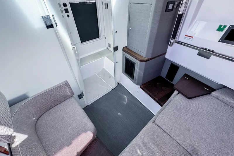  Yacht Photos Pics 2024 Axopar 37XC CROSS CABIN interior with modern seating and sleek design.
