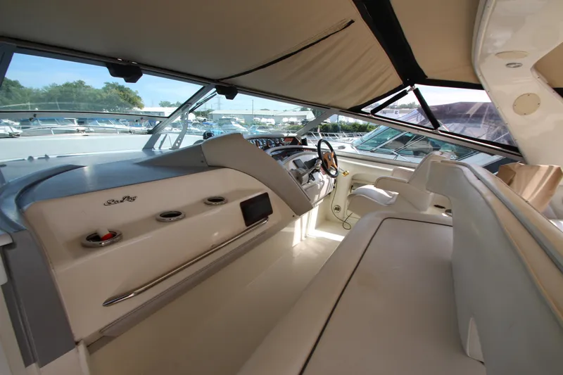  Yacht Photos Pics Interior of 1994 Sea Ray 500 Sundancer yacht with modern helm and seating.