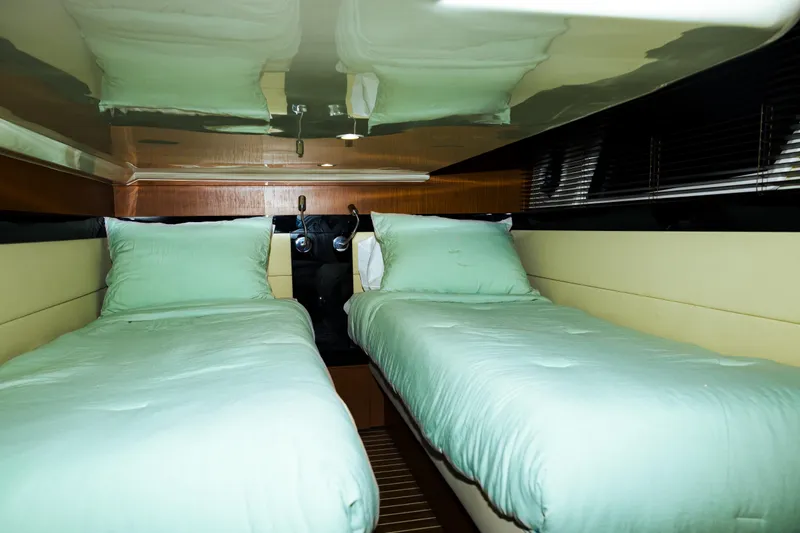  Yacht Photos Pics Twin beds in the 2013 Bavaria Virtess 420 Fly yacht cabin, featuring modern design and comfort.