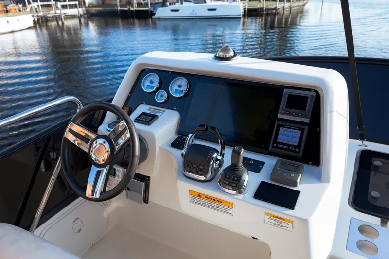  Yacht Photos Pics Cockpit of 2013 Bavaria Virtess 420 Fly yacht with modern navigation controls.