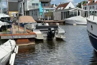 Alufleet Tourer 555 boat docked in a residential marina, 2018 model.