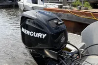 Mercury outboard motor on 2018 Alufleet Tourer 555 boat at dockside.