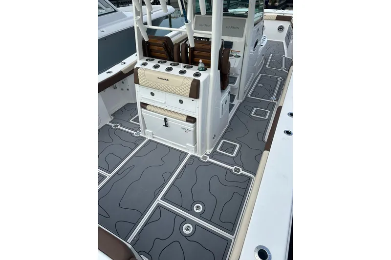  Yacht Photos Pics 2024 Caymas 34 CT boat interior with sleek, modern design and advanced Garmin equipment.