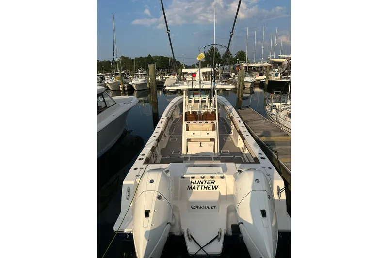  Yacht Photos Pics 2024 Caymas 34 CT boat docked at marina with twin engines.