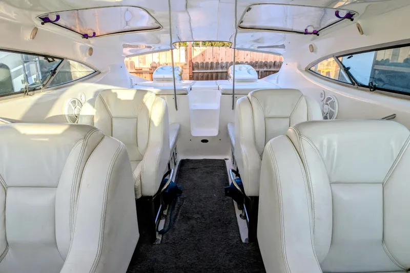 Frisco's Finest Yacht Photos Pics Interior of 2000 Advantage Poker Run 40 boat with white leather seats.