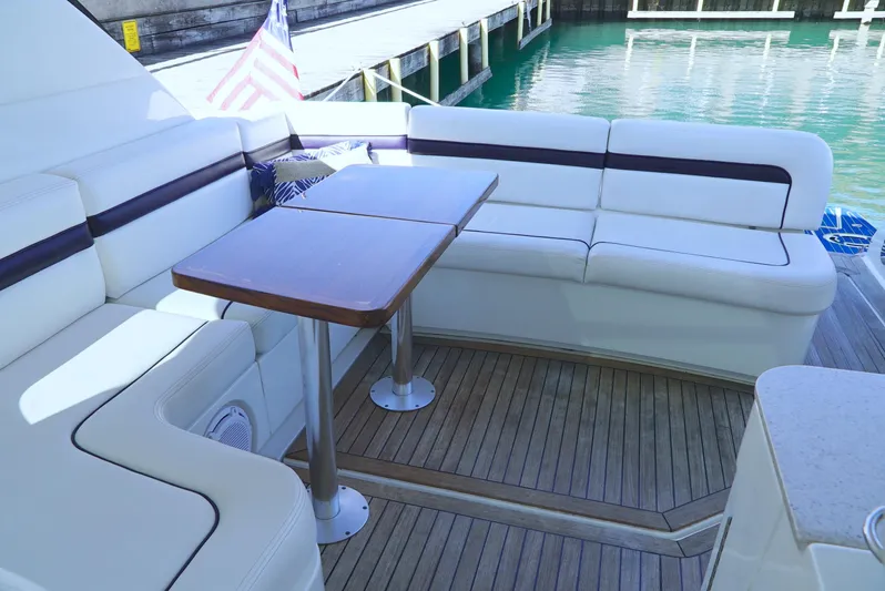 Door V Door Yacht Photos Pics 2011 Sea Ray 470 Sundancer yacht with elegant seating and wooden deck.