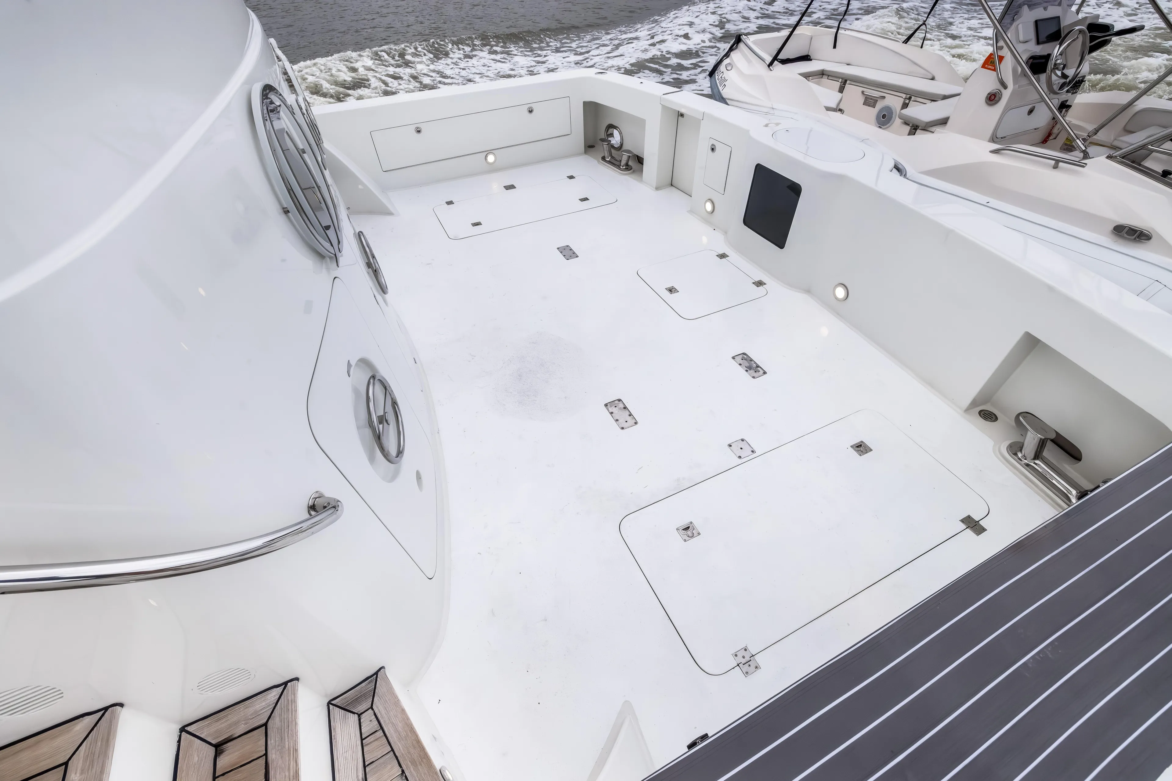 Aurora Yacht Photos Pics Spacious deck of 2012 Cheoy Lee 84 Bravo yacht, featuring sleek design and modern amenities.