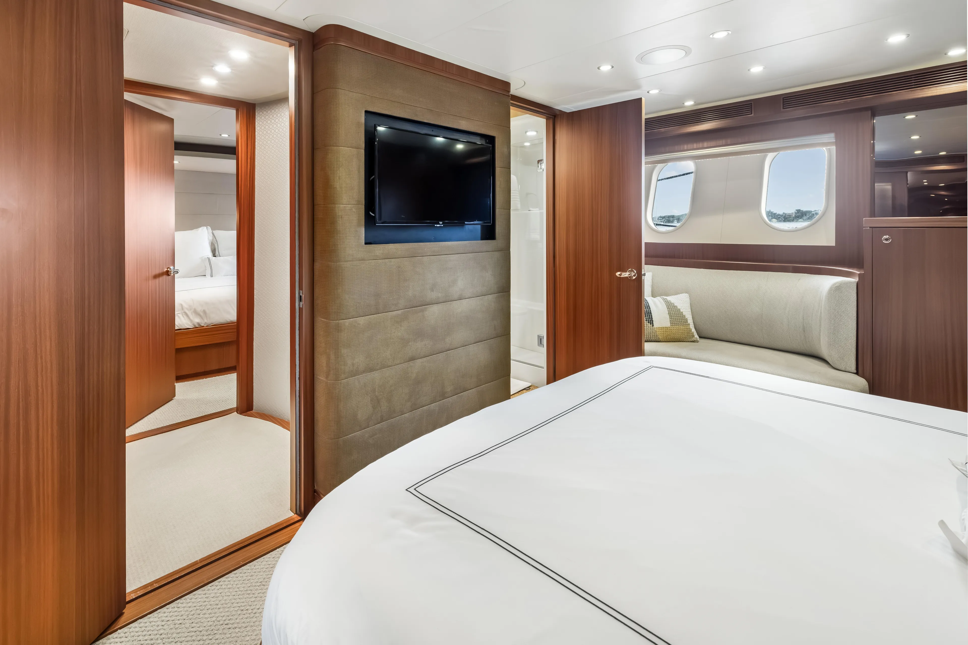 Aurora Yacht Photos Pics Luxurious interior of 2012 Cheoy Lee 84 Bravo yacht with elegant wood finishes and modern amenities.