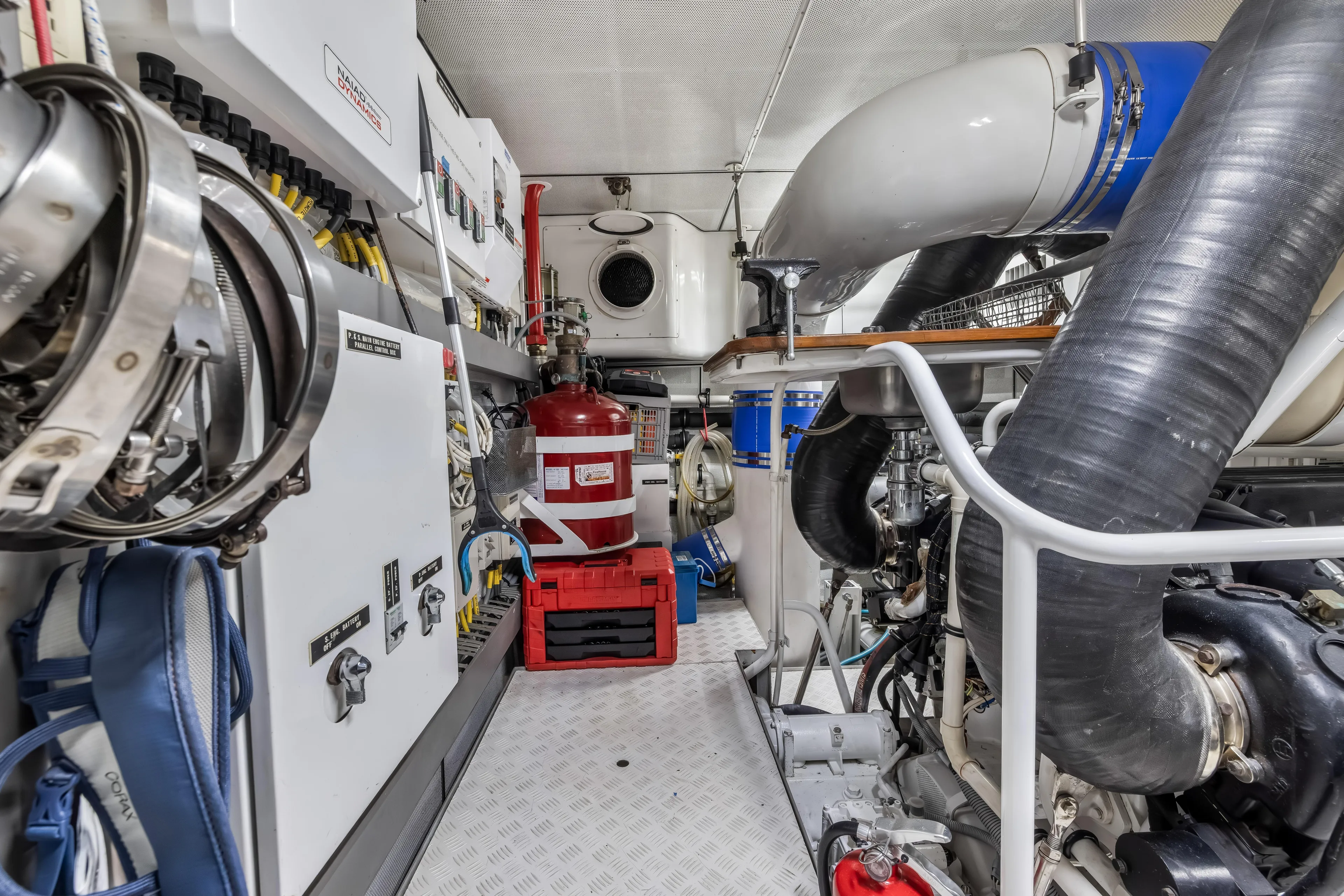 Aurora Yacht Photos Pics Engine room of 2012 Cheoy Lee 84 Bravo yacht with equipment and machinery.