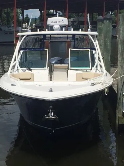  Yacht Photos Pics 2017 Sailfish 325 Dual Console boat docked at marina.