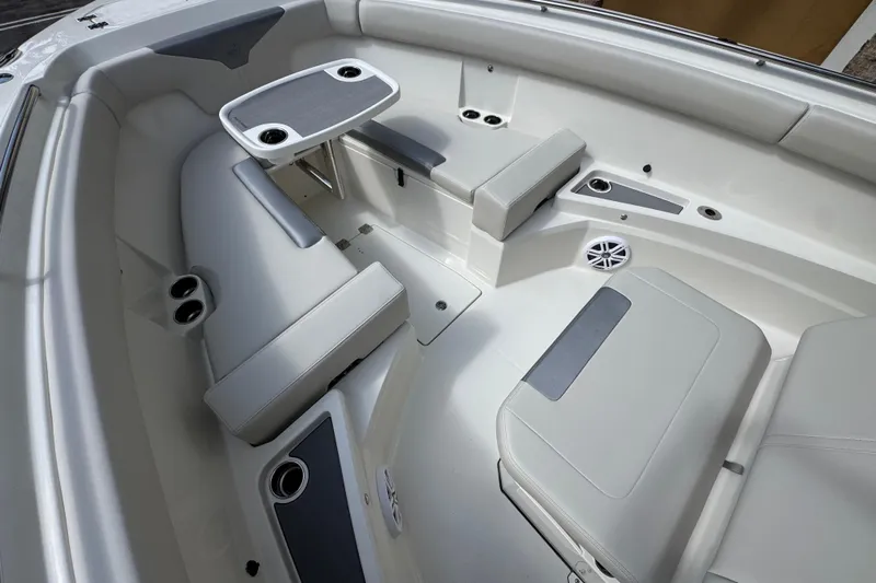  Yacht Photos Pics 2026 Sailfish 312 CC boat interior with seating and table, featuring modern design.