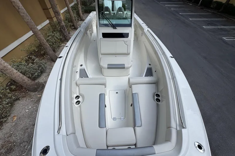  Yacht Photos Pics 2026 Sailfish 312 CC boat interior with spacious seating and sleek design.