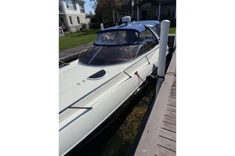 007 Yacht Photos Pics 2000 Sunseeker Superhawk 34 docked, showcasing sleek design and modern features.