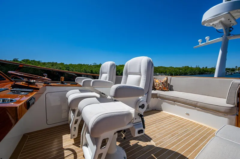 Vera North Yacht Photos Pics Luxury seating on 2021 Hinckley Talaria yacht with clear blue sky backdrop.