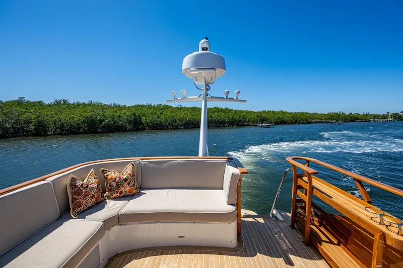 Vera North Yacht Photos Pics Hinckley Talaria 2021 yacht with elegant seating, cruising on a sunny day.