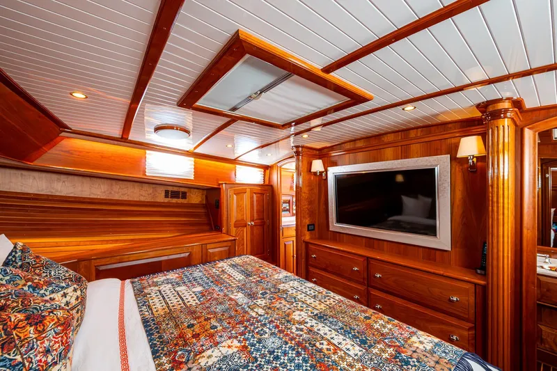 Vera North Yacht Photos Pics Luxurious 2021 Hinckley Talaria yacht cabin with elegant wood finish and modern amenities.