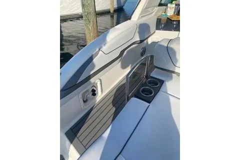  Yacht Photos Pics 2018 Formula 350 Crossover Bowrider interior with cup holders and seating.