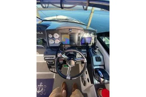  Yacht Photos Pics 2018 Formula 350 Crossover Bowrider dashboard with navigation and control systems.