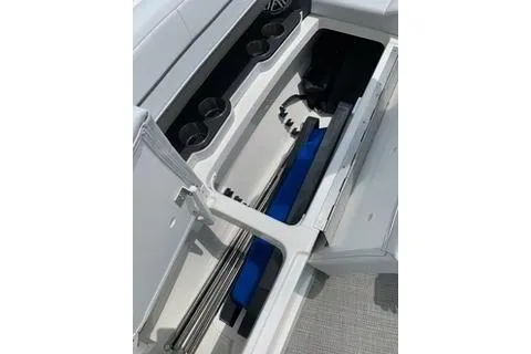  Yacht Photos Pics 2018 Formula 350 Crossover Bowrider storage compartment with organized interior and cup holders.