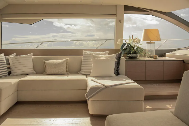 Gaia Yacht Photos Pics Luxurious interior of 2022 Sunseeker Manhattan 68 yacht with elegant seating and decor.