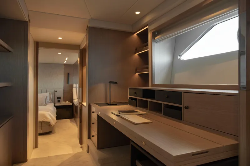 Gaia Yacht Photos Pics Luxurious interior of 2022 Sunseeker Manhattan 68 yacht with elegant wood finishes.