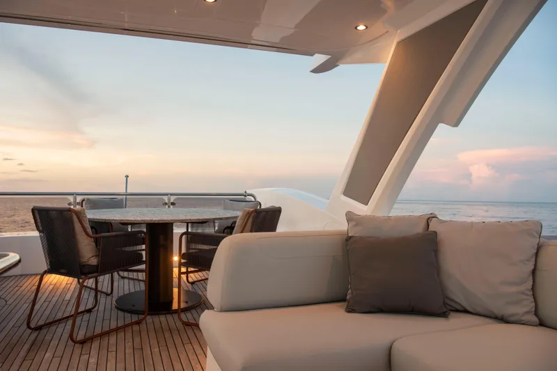 Gaia Yacht Photos Pics Luxurious Sunseeker Manhattan 68 yacht deck with elegant seating, ocean view, 2022 model.