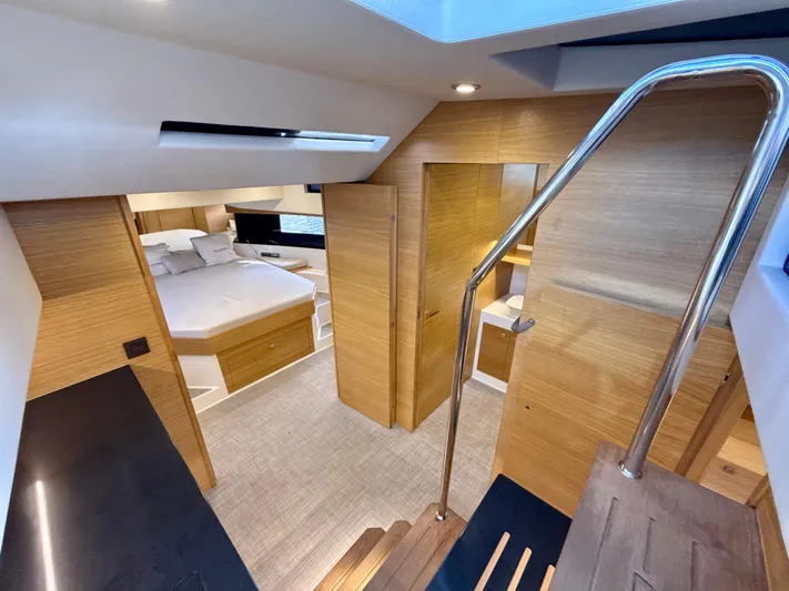  Yacht Photos Pics Luxurious interior of 2023 De Antonio Yachts D50 Coup&eacute; with modern wood finishes.