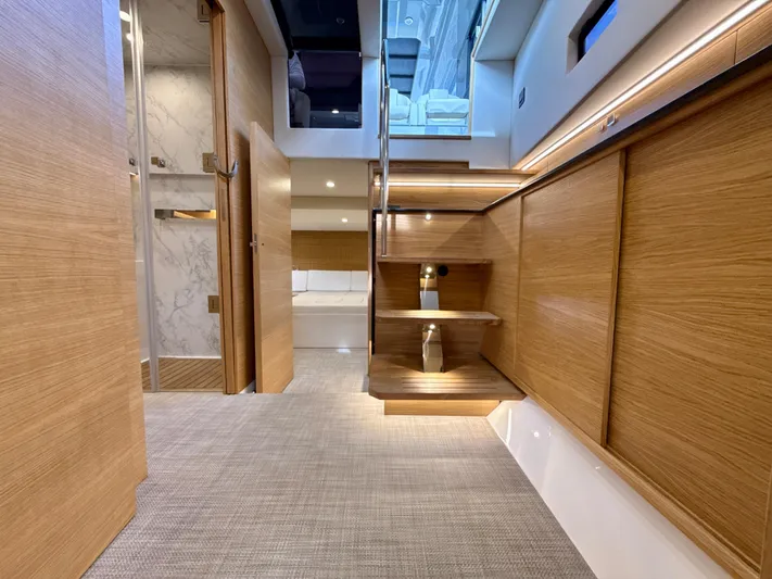  Yacht Photos Pics Luxurious interior of 2023 De Antonio Yachts D50 Coup&eacute; with modern wood finishes.