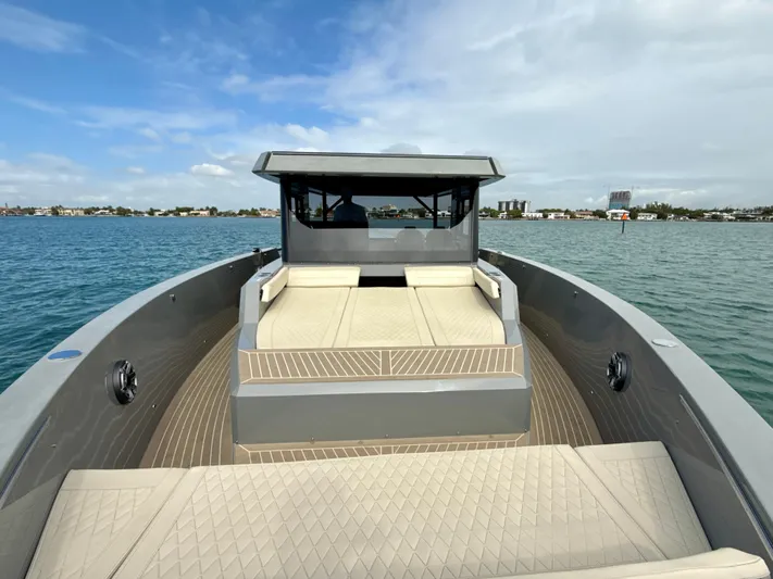  Yacht Photos Pics 2023 De Antonio Yachts D50 Coup&eacute; on water, showcasing sleek design and spacious deck.