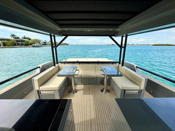  Yacht Photos Pics Luxurious 2023 De Antonio Yachts D50 Coup&eacute; with elegant seating and scenic ocean view.
