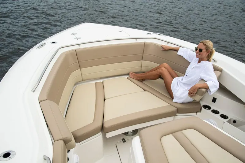  Yacht Photos Pics Woman relaxing on 2022 Sailfish 360 CC boat.