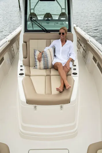  Yacht Photos Pics Woman relaxing on 2022 Sailfish 360 CC boat.