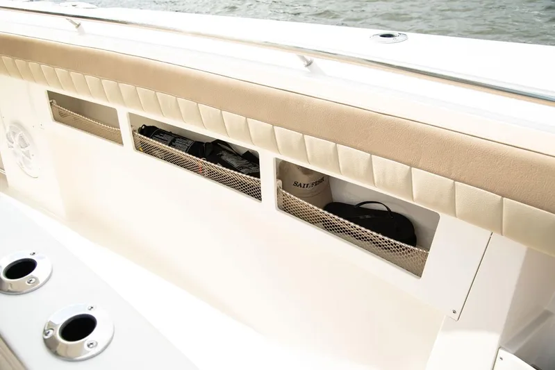  Yacht Photos Pics Sailfish 360 CC 2022 boat with storage compartments and cup holders.