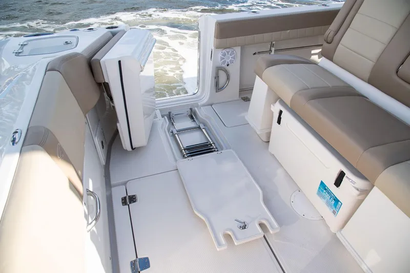  Yacht Photos Pics Interior of 2022 Sailfish 360 CC with seating and storage area.
