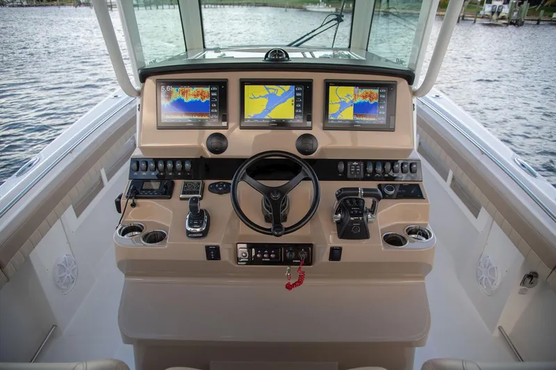  Yacht Photos Pics 2022 Sailfish 360 CC helm with advanced navigation systems.