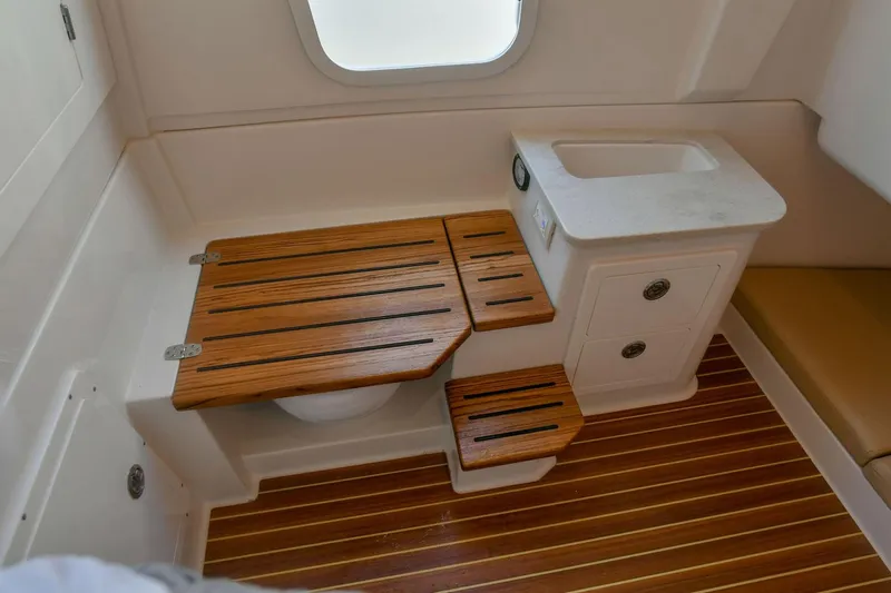  Yacht Photos Pics Interior of 2022 Sailfish 360 CC with wooden accents.