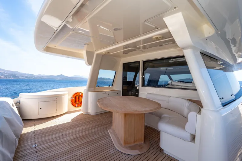 La Luce Yacht Photos Pics Luxurious 2008 Custom Line Navetta 26 yacht deck with seating and ocean view.
